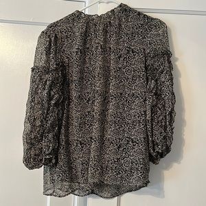 Long sleeve pretty printed blouse. Size L. PRICE DROP